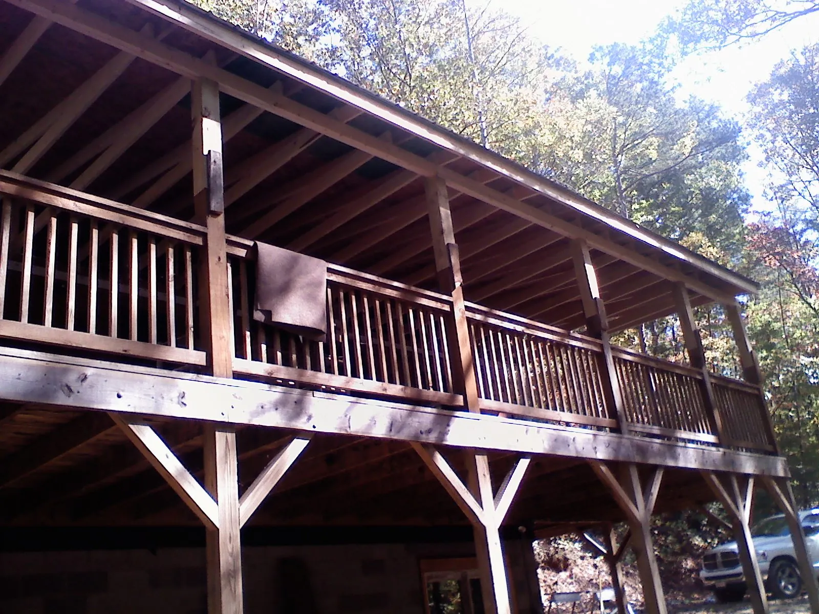 Timber framing under a new elevated porch and deck — Roof Leak Repair in Dearborn Heights by Roofing Brothers
